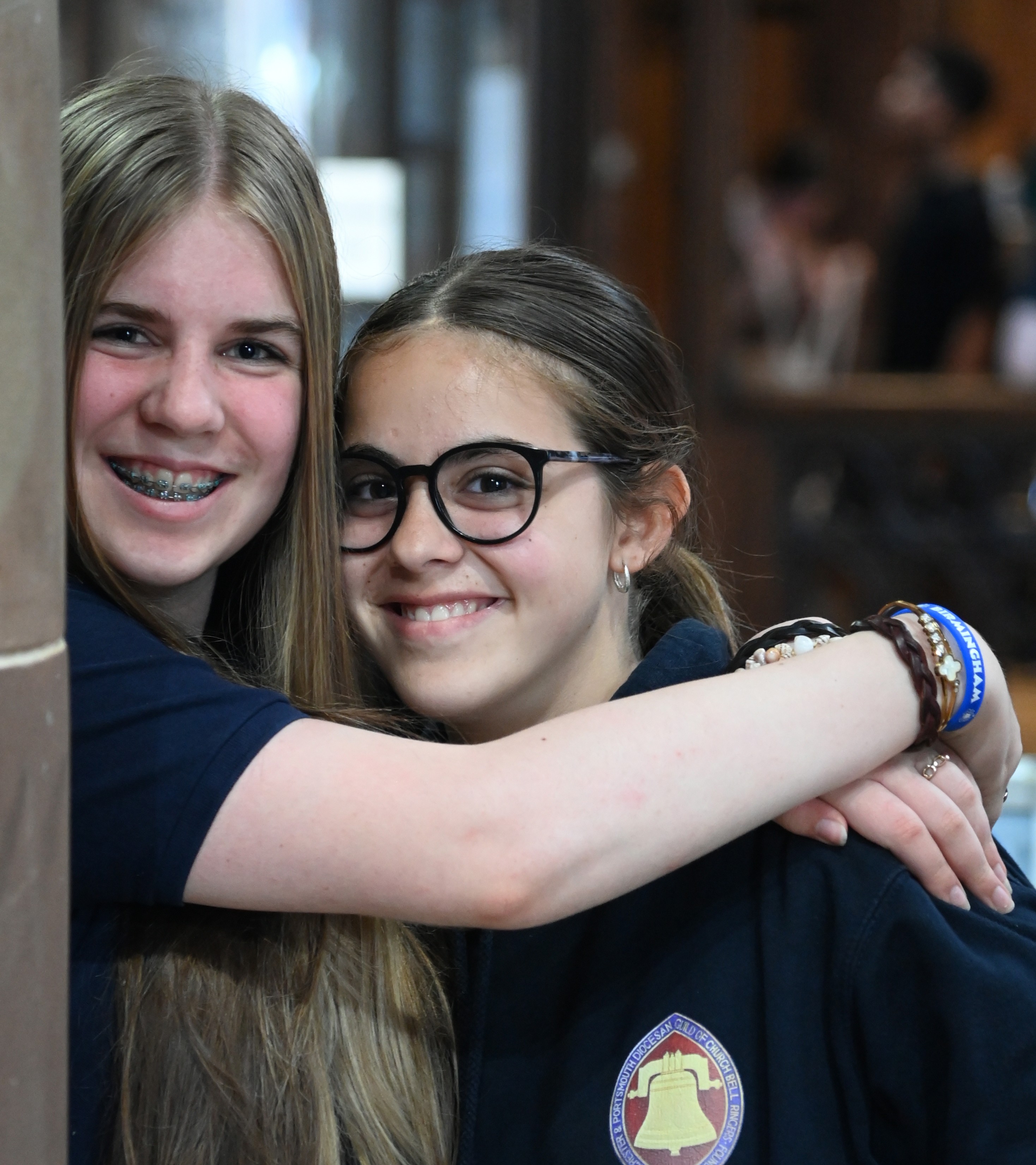 Two young ringers smiling together at the contest